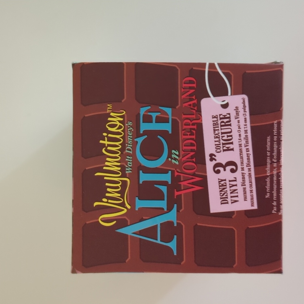 Alice in wonderland Disney Vinyl Collectible Figure.